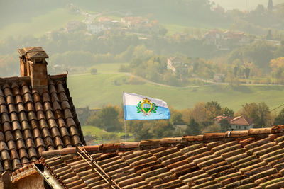 Built structure on landscape against buildings