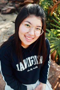 Portrait of smiling young woman