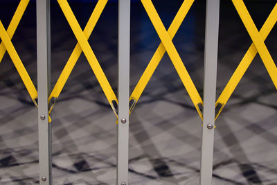 Full frame shot of yellow metal fence