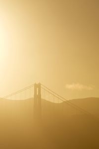 Suspension bridge at sunset