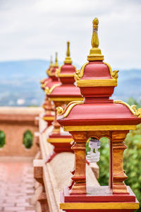 Close-up of temple against building