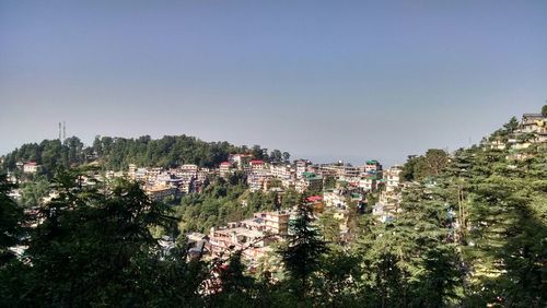 Residential buildings against blue sky