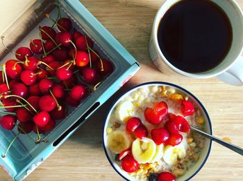 High angle view of strawberries in bowl on table