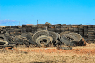 Piles of used tires at a junkyard 