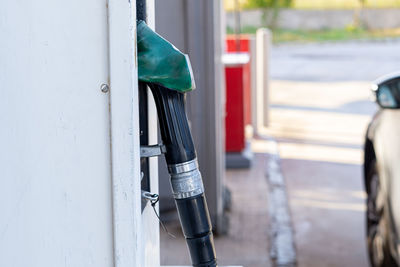 Old gas pump hanging at the gas station.