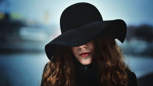 Portrait of woman wearing hat