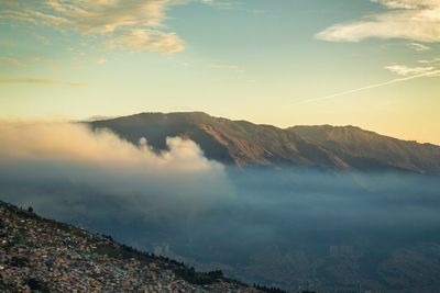 Scenic view of mountains against sky during sunset