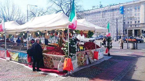 People at market stall