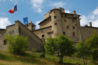 Low angle view of historical building against sky