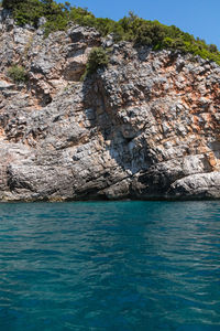 Scenic view of rock formation in sea