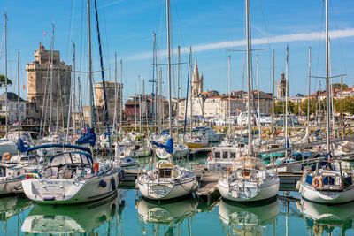 Boats moored in harbor