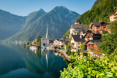 Panoramic view of lake and buildings in town