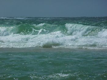 Waves splashing on rocks