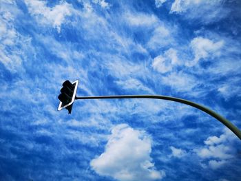 Low angle view of street light against sky