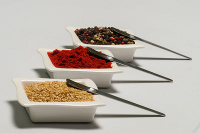 Close-up of food on table against white background