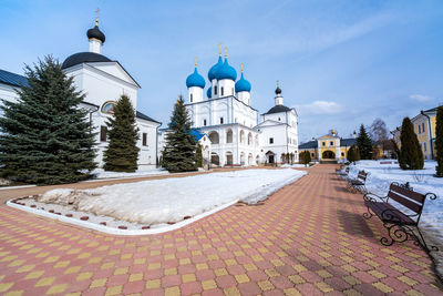 View of white building against sky