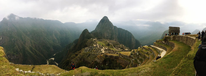 Panoramic view of mountain range against sky