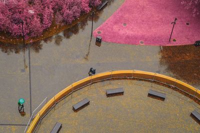 High angle view of people walking in a rainy day