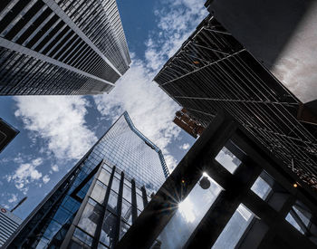 Low angle view of modern buildings against sky