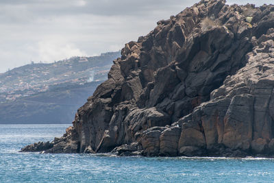 Scenic view of sea and mountains