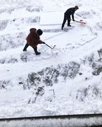 People on snow covered mountain