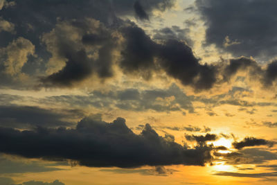 Low angle view of dramatic sky during sunset