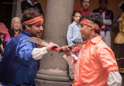 Side view of two people standing outdoors