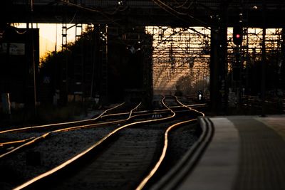 Railroad station platform at sunset