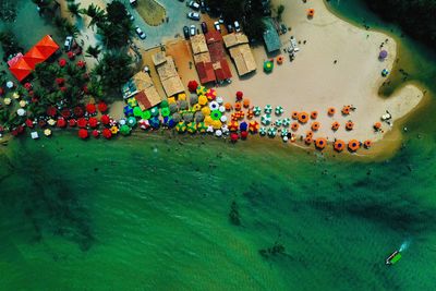 High angle view of people swimming in sea