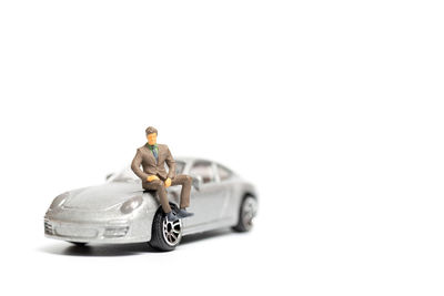 Close-up of toy car against white background