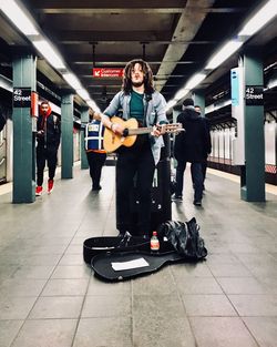 Portrait of people at subway station