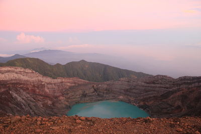 Scenic view of mountains against sky during sunset