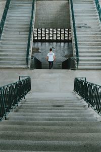 High angle view of man on staircase