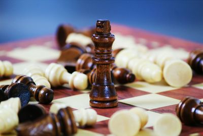 Close-up of chess pieces on board