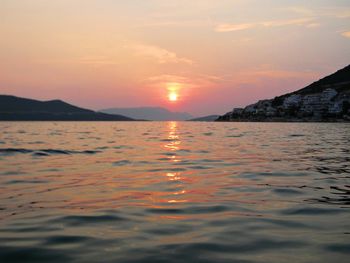 Scenic view of sunset over river