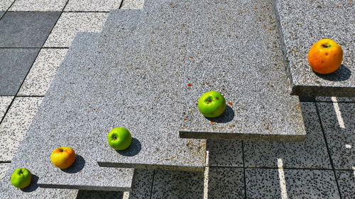 High angle view of apples on street