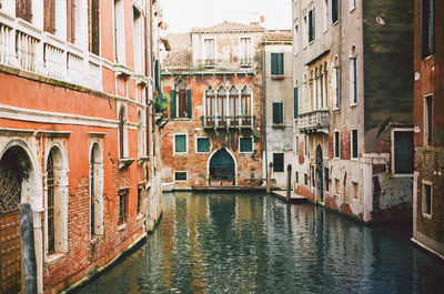 View of canal along buildings