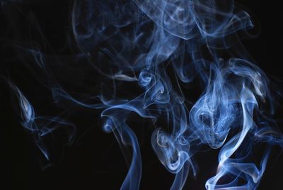 Close-up of smoke against black background