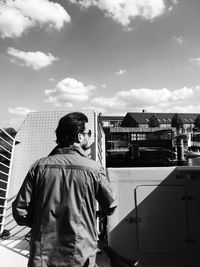 Full length of man standing against sky