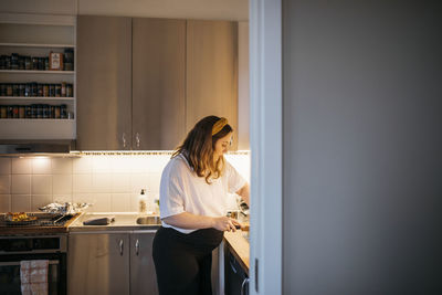 Woman in kitchen