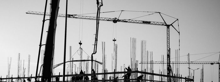 Low angle view of construction site against sky