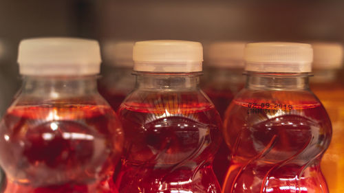 Close-up of wine bottles on table