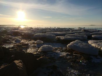 Scenic view of sea at sunset