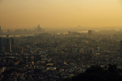 High angle shot of cityscape against clear sky