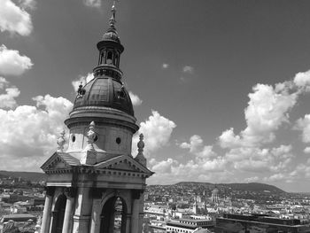 Low angle view of historical building against cloudy sky