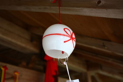 Low angle view of pendant light hanging on ceiling