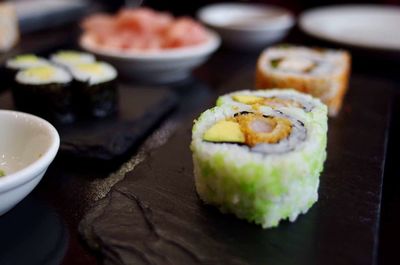 Close-up of sushi served on table