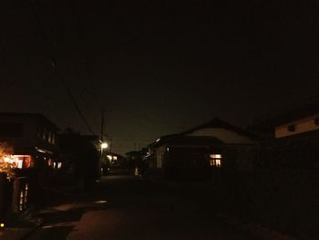 Illuminated street light at night