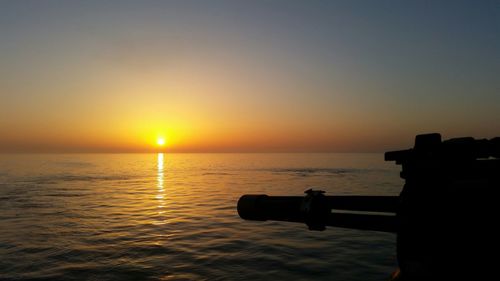 Scenic view of sea at sunset