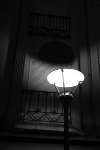 Low angle view of illuminated lamp